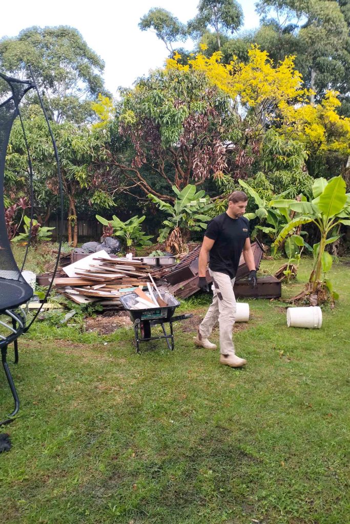 otg rubbish removal team member doing a garden clean up in newtown sydney