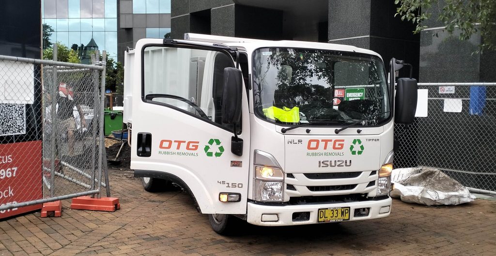 otg rubbish truck on pacific highway rubbish removal